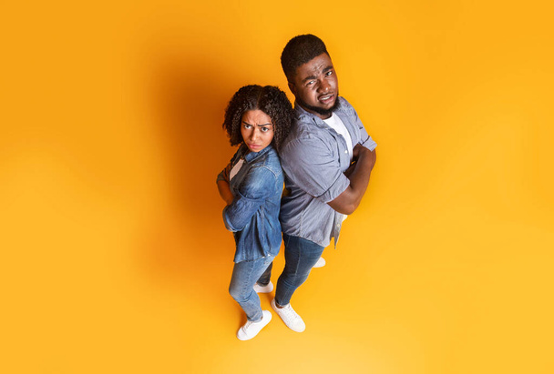 Young Black Couple Looking Suspiciously At Camera In Disbelief, Top View - Fotó, kép