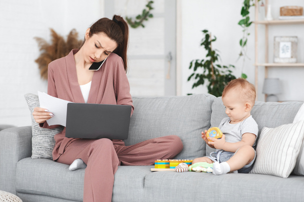 Busy Mother Working Remotely At Home While Taking Care Of Baby - Photo, Image