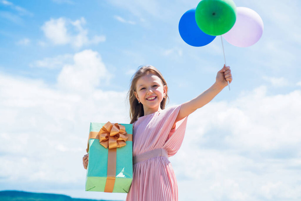 for me. concept of dreaming. childhood happiness. kid fashion beauty. imagination and inspiration. birthday party present. small girl with balloon. prepare for holiday. ready to celebrate - Фото, зображення