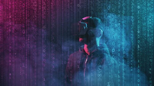 Portrait of a man in virtual reality helmet over abstract digital background. Obscured dark face in VR goggles. Internet, darknet, gaming and cyber simulation concept. - Foto, afbeelding