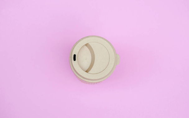 Top view image of coffee paper cup on pink pastel background. Copy space - Photo, Image