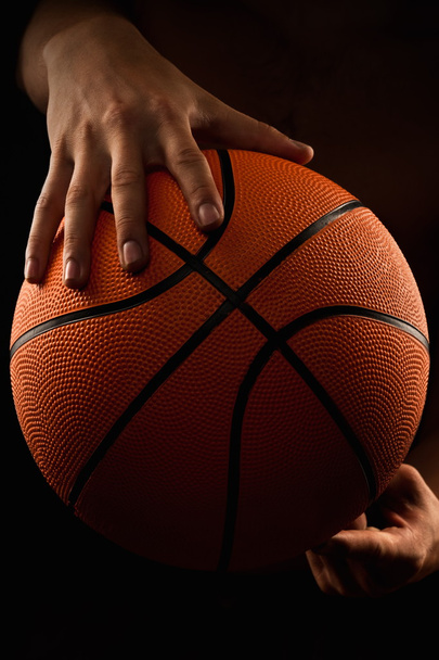 Basketball ball in male hands - Фото, изображение