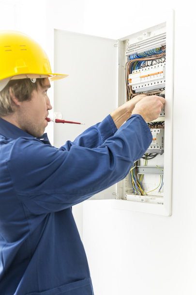Electrician repairing fuses - Photo, Image