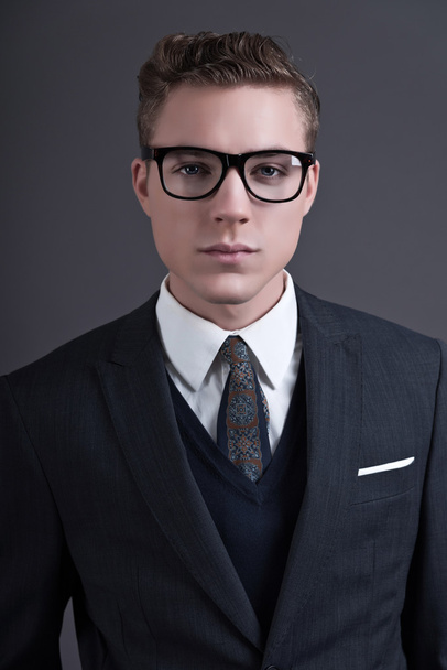 Retro fifties fashion young businessman with black glasses weari - Foto, afbeelding