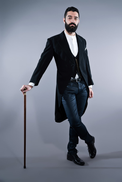Retro hipster 1900 mode man met zwart haar en baard. di - Foto, afbeelding