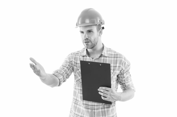 Site inspection. Civil engineer or technician isolated on white. Engineer or architect at work. Construction surveillance engineer in hardhat. Engineering and architecture. Building and constructing - Foto, Bild