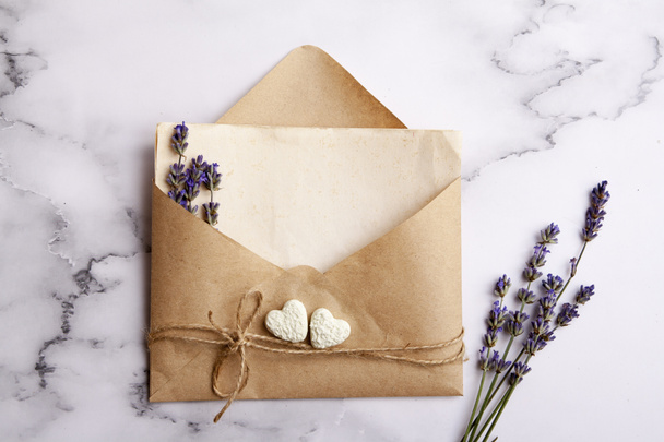 Envelope with copy space, lavender, hearts. Love letter, wedding concept - Photo, Image