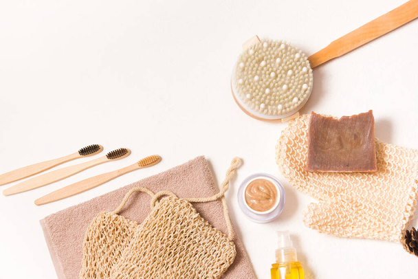 eco friendly hygiene set on a white background, bath products made from natural materials for body care and oral cavity, zero waste bath accessories concept - Foto, Imagem