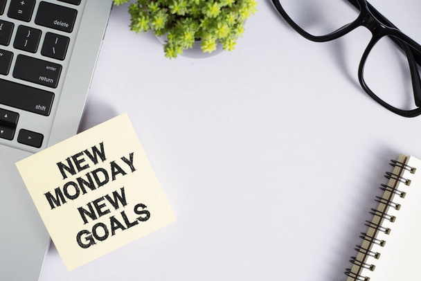 New Monday New Goals Concept on office desktop top view with copy space. - Fotoğraf, Görsel