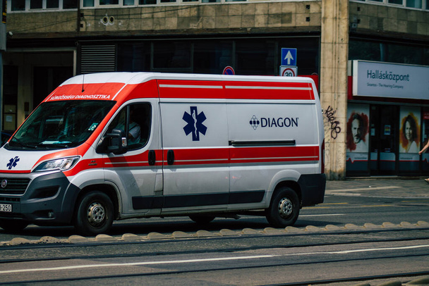 Budapest Hungary july 15, 2020 View of a traditional Hungarian ambulance driving through the streets of Budapest the capital and the most populous city of Hungary - Photo, Image