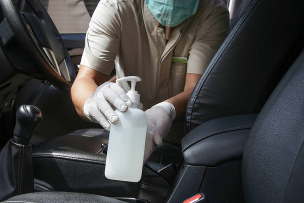 Car Disinfecting. Safety measures for car maintenance during coronavirus. - Photo, Image