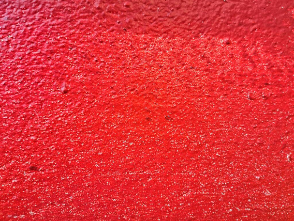 La superficie rugosa del hormigón rojo
. - Foto, imagen