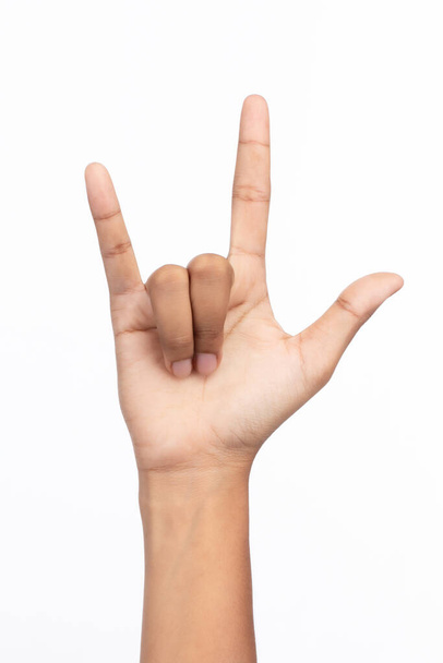 Mano de mujer mostrar gesto dedos símbolo del amor, estudio de tiro de luz aislado sobre fondo blanco
 - Foto, imagen