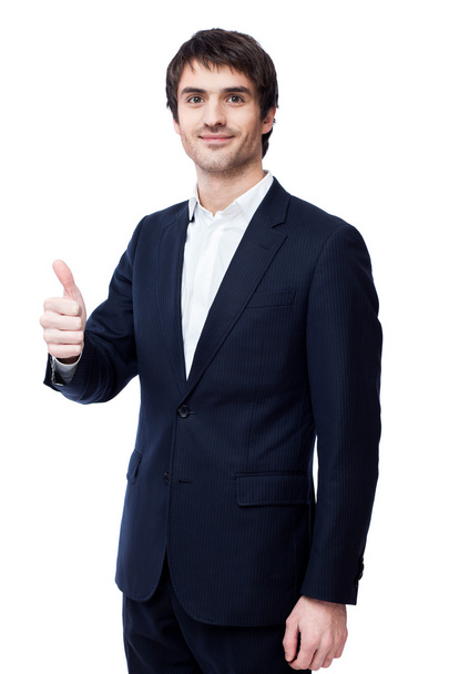 Smiling businessman with thumb up - Foto, imagen