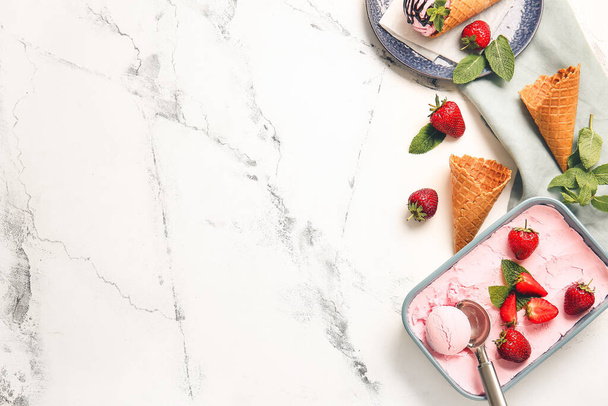 Tasty strawberry ice cream on white background - 写真・画像