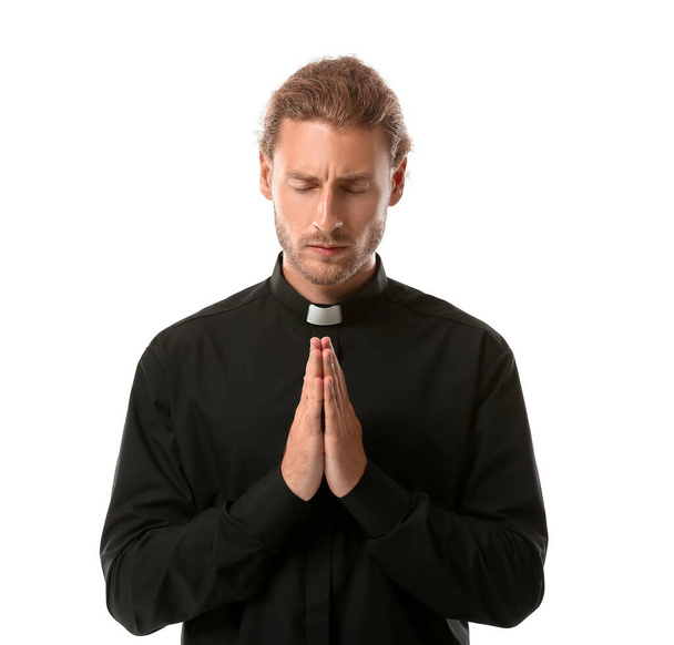 Praying priest on white background - Φωτογραφία, εικόνα
