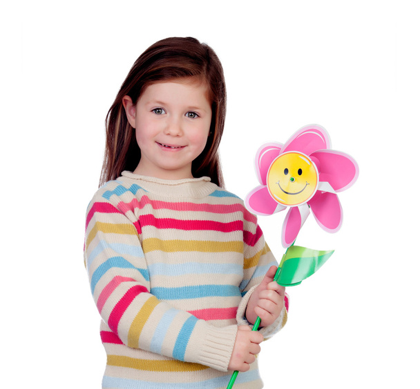 Beautiful little girl with a pinwheel - Fotoğraf, Görsel