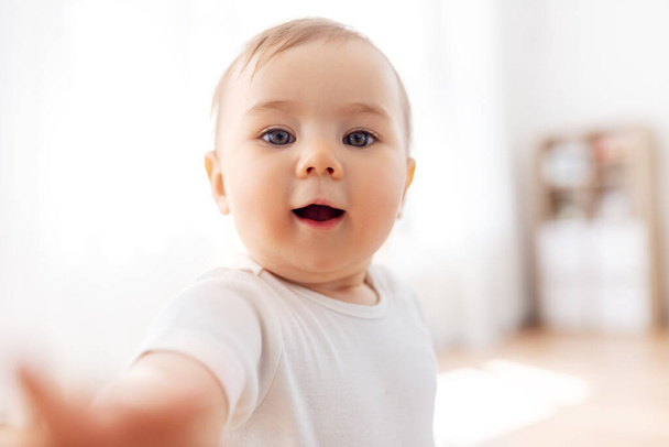 portrait or selfie of little baby at home - Φωτογραφία, εικόνα