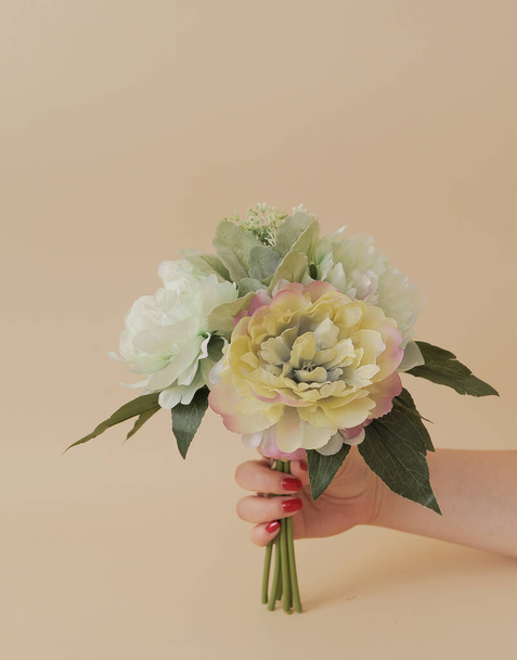 artificial flowers  on beige background - Foto, Imagem