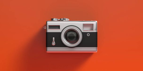 Photo camera vintage style. Retro old fashioned camera isolated on orange color background. 3d illustration - Zdjęcie, obraz
