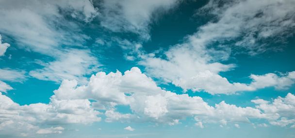 blue sky white fluffy clouds background . Beautiful blue sky and white cumulus clouds abstract background. Cloudscape background. Blue sky and fluffy white clouds on sunny. - Zdjęcie, obraz