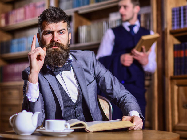 Men in suit, detectives spend leisure in library. - Foto, Imagem