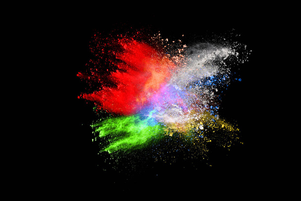 abstract colored dust explosion on a black background.abstract powder splatted background,Freeze motion of color powder exploding/throwing color powder, multicolored glitter texture. - Фото, зображення