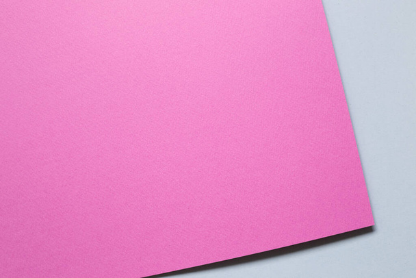 Abstraktes rosa und graublau geschichtetes Farbpapier Hintergrund - Foto, Bild