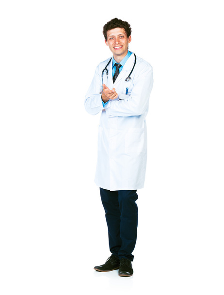Портрет усміхненого лікаря, що стоїть на білому
 - Фото, зображення