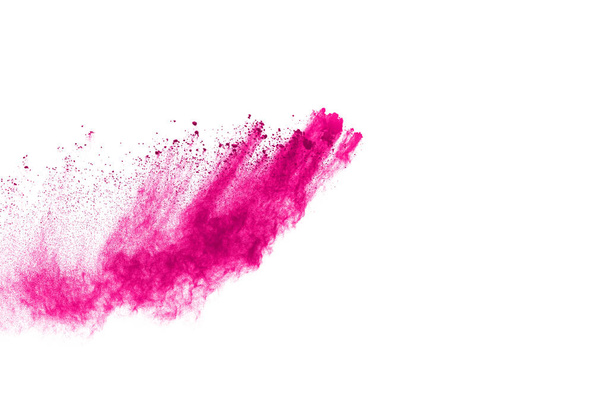 Abstract roze poeder splatted achtergrond, Freeze beweging van kleur poeder exploderen / gooien kleur poeder, kleur glitter textuur op witte achtergrond. - Foto, afbeelding