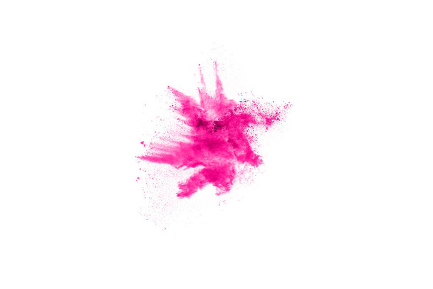 Abstract pink powder splatted background,Freeze motion of color powder exploding/throwing color powder,color glitter texture on white background. - Foto, afbeelding