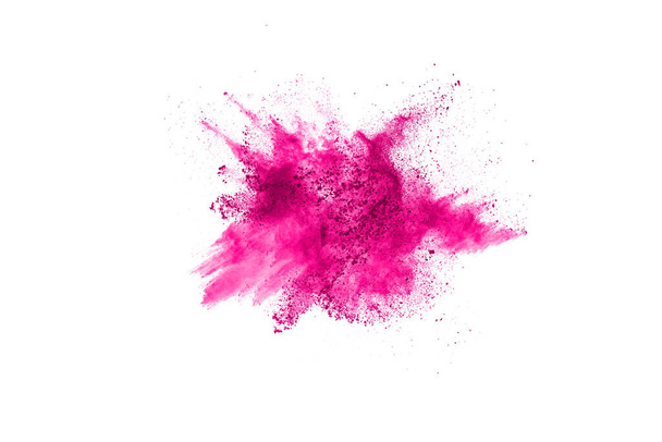 Fondo salpicado de polvo rosa abstracto, congelar el movimiento del polvo de color que explota / lanza polvo de color, textura de brillo de color sobre fondo blanco. - Foto, Imagen