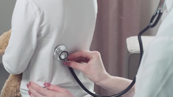 Therapist examination. Female doctor with phonendoscope in hand. - Materiaali, video