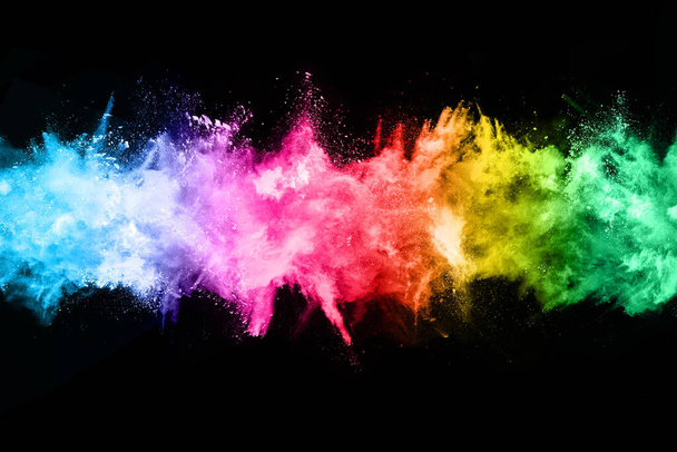 Black glitter background with multicoloured splashes. Stock Photo