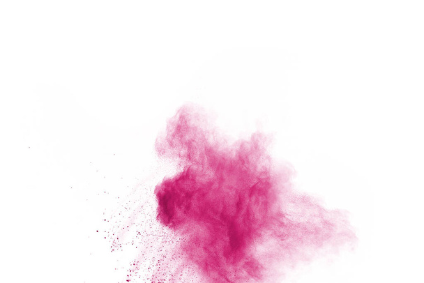 Streszczenie różowy proszek rozbryzgane tło, zamrożenie ruchu proszku kolor eksplodujący / rzucanie proszku kolor, kolor brokat tekstury na białym tle. - Zdjęcie, obraz