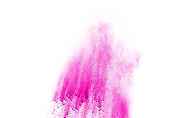 абстрактний рожевий порошок розділений фон, заморожування руху кольорового порошку вибуху / кидання кольорового порошку, текстури кольорового глютера на білому тлі
. - Фото, зображення