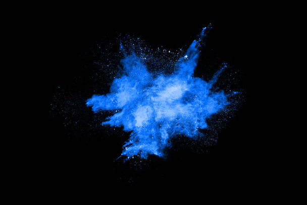 Blue powder explosion on black background. Colored cloud. Colorful dust explode. Paint Holi. - Photo, Image