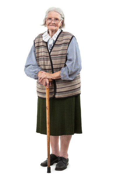 yaşlı kadın beyaz zemin üzerine baston - Fotoğraf, Görsel
