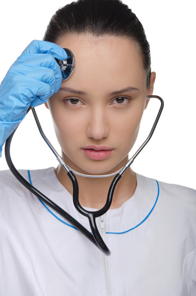 Doctor listens to a stethoscope - Фото, зображення
