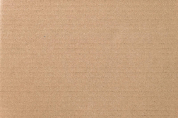 Fondo de textura de hoja de cartón marrón. Textura de la caja de papel reciclado en viejo patrón vintage para el fondo. - Foto, Imagen