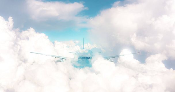 Ein Flugzeug, das an einem sonnigen Tag auf schönen weißen, flauschigen Wolken unter strahlend blauem Pastellhimmel unterwegs ist  - Foto, Bild
