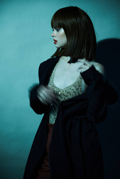  woman t-shirt with sequins dark room casual wear - Zdjęcie, obraz