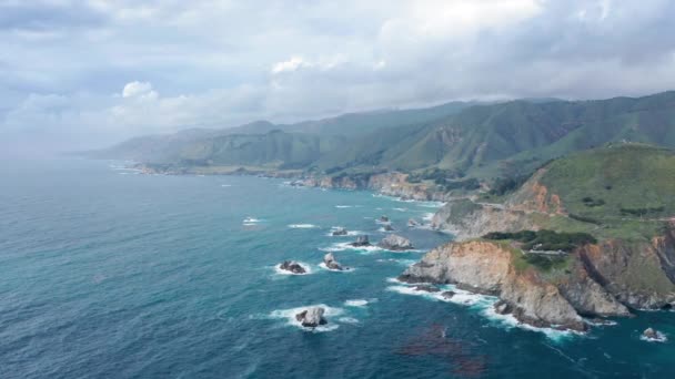 Inspiring view of the mountainous ocean coastline under the overcast sky. Aerial footage. - Footage, Video