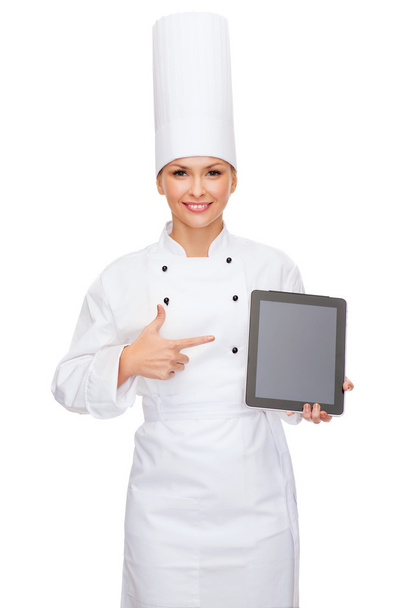 Smiling female chef with tablet pc blank screen - Фото, зображення