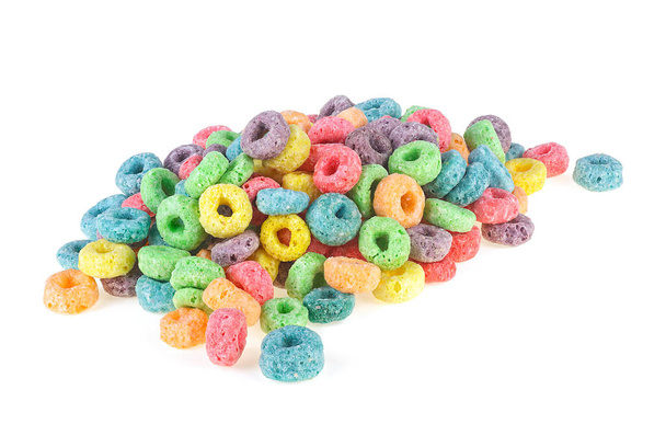 Pile of sweetened corn cereals isolated on a white background. Colorful corn rings. - Foto, Bild