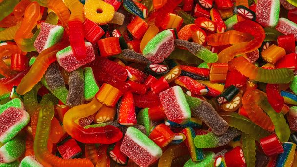Assorted tasty gummy candies. Top view. Jelly  sweets background.  - Photo, Image