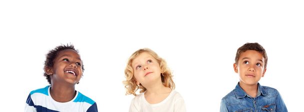 Three different children together isolated on a white background - Foto, afbeelding