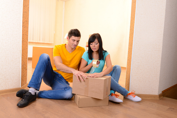 Young couple moves into new home - Photo, Image