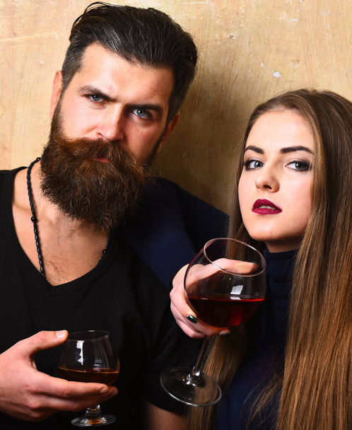 Drinks and love. Man with beard and girl hold drinks - Фото, зображення