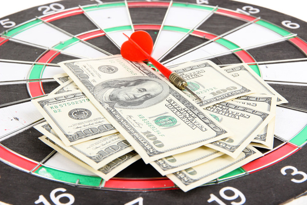 Dart on dartboard and money close up. Concept of success. - Zdjęcie, obraz
